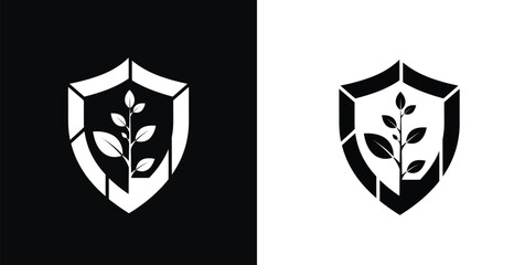 Obraz premium A black and white logo featuring a shield with a plant design on a contrasting background