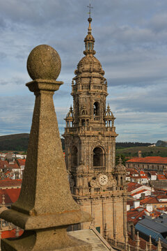 Monumental Baroque Bell Tower Above Red Roofs of a Historic City