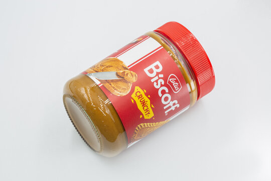 Lotus Biscoff crunchy spread jar closeup on white.