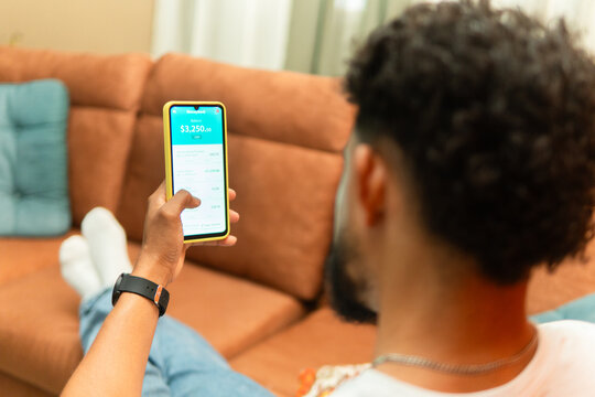 Person checking online banking application on device