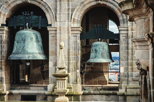 Historic Bells in a Stone Bell Tower with Monumental Arches
