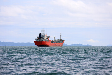 Obraz premium Oil products tanker in a sea off the coast. Marine petroleum transportation