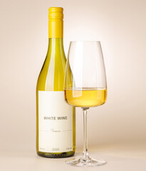 Fototapeta premium White wine bottle mockup with glass