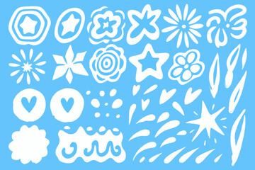 Collection of hand drawn white floral and star shapes on a blue background © MSTShikha