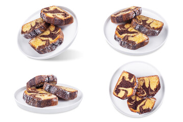 Fototapeta premium Chocolate vanilla cake in a plate on a white isolated background