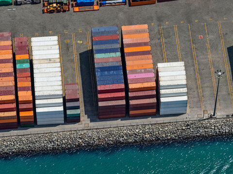 Aerial view of a shunting platform and storage of maritime containers in port terminal
