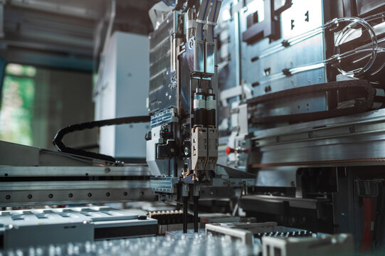 Automated Manufacturing Unit Employing Specialized Gripper And Rotary Indexing For Small Parts