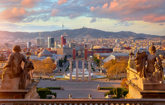 Sunset over Barcelona, Spain. Square of Spain. Evening urban panorama with view at the columns and fountain. Scenic cityscape. Popular travel destination in Europe
