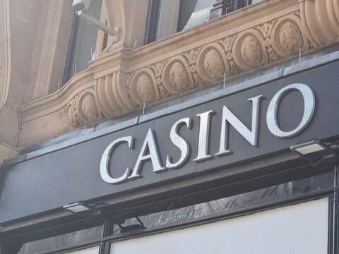London UK 04.07.2025 casino sign on elegant historic building facade with decorative stone architecture and illuminated letters representing nightlife entertainment venue in central london