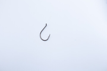 Fishing hook displaying sharp barb for catching fish