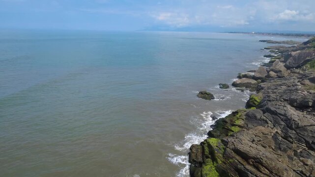 Rocky Coastal Trail Surrounded by Tropical Nature