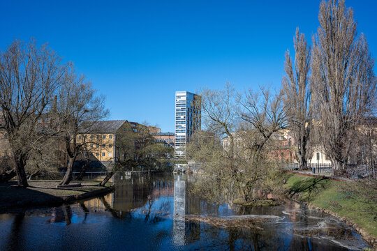 Motala Stream and the industrial landscape at Gamlebro during spring. Norrk&ouml;ping is a historic industrial town in Sweden.