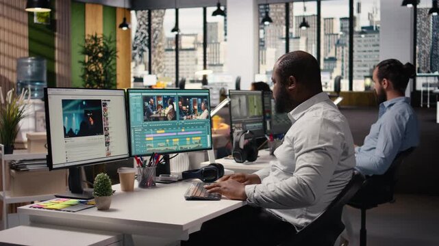 Video editor, film footage on computer, editing cinematic motion graphics project. Black man using software toolbar and sliders to edit montage, cutting recorded clips and adjusting color.
