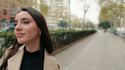 Fototapeta premium Woman On A City Street In Neutral Coat