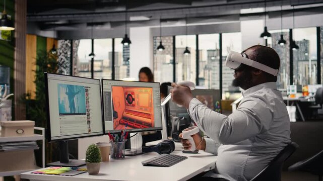 Black game developer designing assets with VR headset at the office, working on spatial video game in space. Engineer uses modeling tools on animation software, creating futuristic virtual world.
