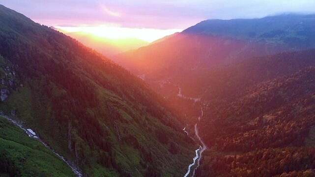 New Zealand valley stream and green meadows open across treeless alpine terrain in wild terrain. Glacial basin, grassy slopes, broad uplands define a remote highland landscape with freshness.
