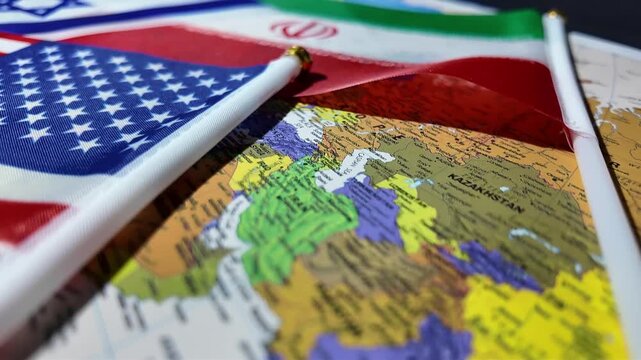 American flag positioned over a world map with Middle Eastern flags in background.