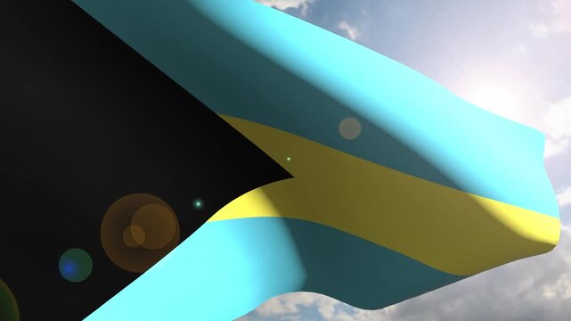 Bahamas Flag Fluttering Gracefully Against the Open Sky