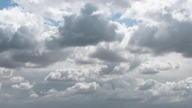 Cloud Close up Timelapse - Sunny Day, Over small town, mountains in the background 