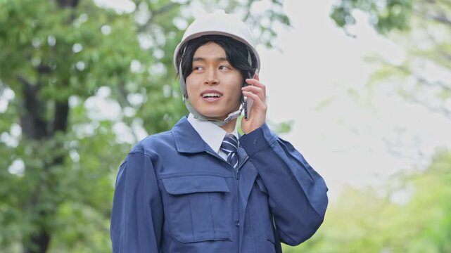 作業着を着た男性