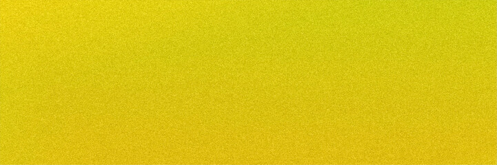 Fototapeta premium Wide yellow tones blend with a subtle grainy texture, forming a bright horizontal abstract banner perfect for website headers, advertising strips, and bold promotional layouts.
