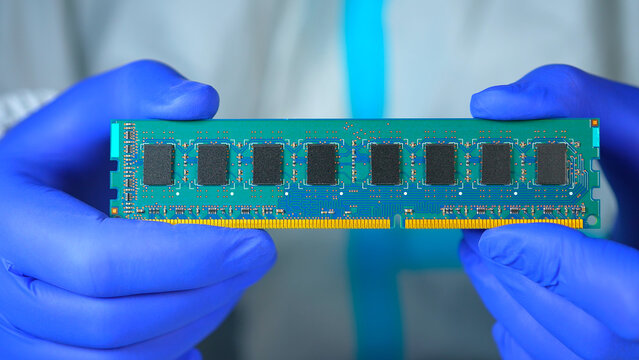 RAM stick with DRAM, Dynamic Random Access Memory chips. Core storage components holds data temporarily for quick CPU access. Storage of binary information using billions of capacitors and transistors