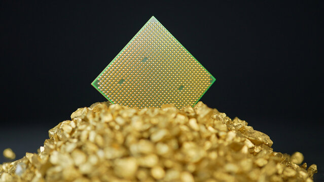 CPU or GPU in pile of gold nuggets display, concept of rear earth elements mining demand. Mining and AI global demand for REEs. Building of data centers and processing power for AI and LLMs.