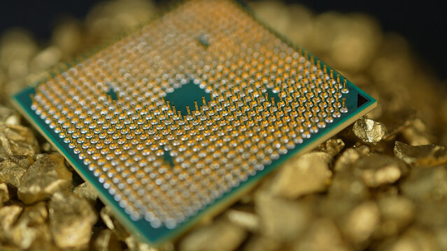 Concept of CPU chips shortage due Artificial Intelligence AI data centers development demand. Central Processing Units used for Servers Computer Systems. CPU in pile of gold nuggets.