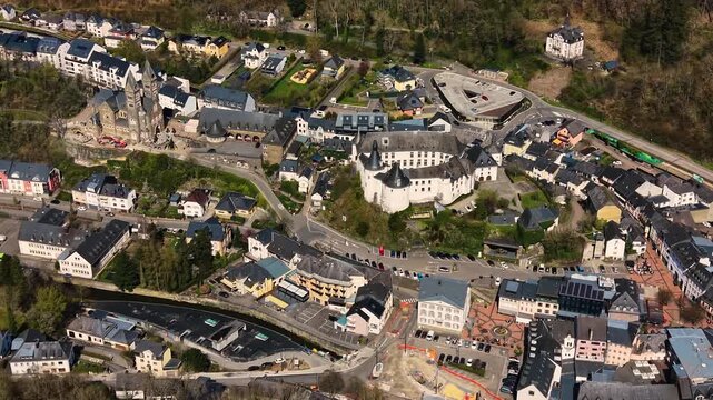 A panoramic Aerial view of the city and castle  Clervaux in Luxembourg, on a sunny spring noon