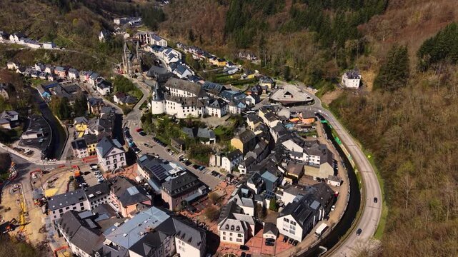 A panoramic Aerial view of the city and castle  Clervaux in Luxembourg, on a sunny spring noon