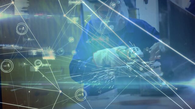 Middle-aged man wearing blue coveralls gloves visor grinding metal at workbench with grinder HUD