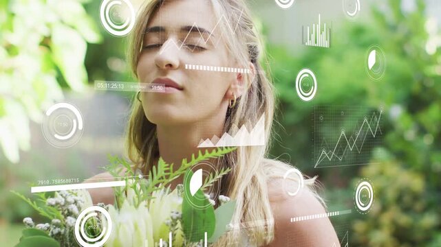 Vertical video: Woman inhaling bouquet, relaxing as white HUD overlaying breath data for health