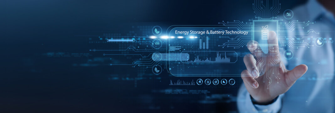 Energy specialist holding battery module. Energy storage and battery technology support efficient power storage for renewable and electric systems.