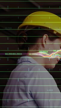 Vertical video: Site engineer lowering gaze and inspecting panel, AR grid waveform tracking face