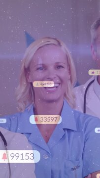 Vertical video: Nurse smiling badges popping and counts updating camera zooming to show health team