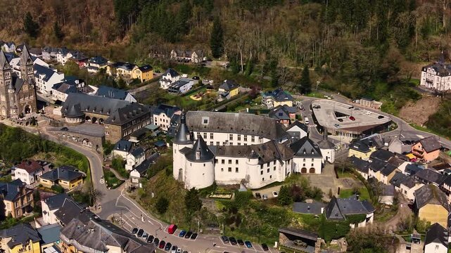 A panoramic Aerial view of the city and castle  Clervaux in Luxembourg, on a sunny spring noon