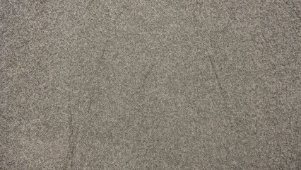 Fototapeta premium A close-up view of a textured gray fabric surface