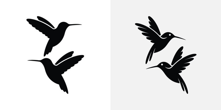Black silhouettes of hummingbirds in flight flying
