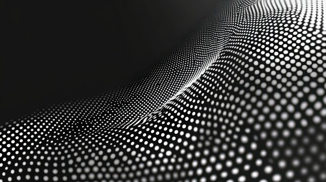 A black and white image of a wavy surface made up of small dots