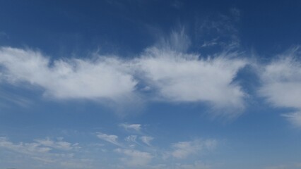 Obraz premium Soft White Clouds in Blue Sky Background