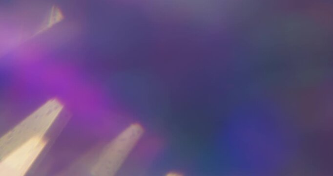 Defocused light overlay. Neon glow. Crystal diamond twinkle luminosity texture. Optical purple blue bokeh reflection colorful background.
