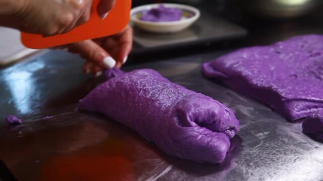 Ube cheese pandesal being prepared for baking