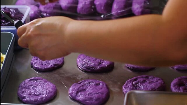 Ube cheese pandesal being prepared for baking