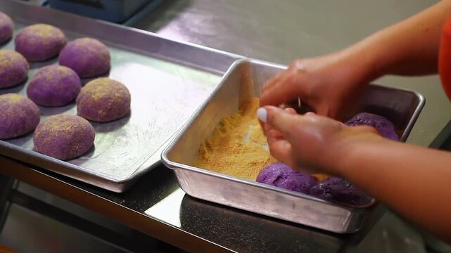 Ube cheese pandesal being prepared for baking