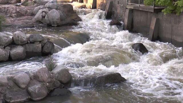 Helsinki, Finland. Cascades and shallows of the river Vantaa. Warm summer  evening.