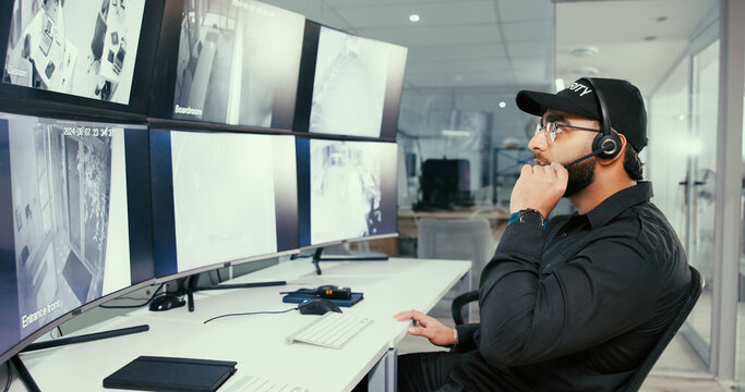 Security, control room and man with headset by monitor for communication, surveillance or report. Safety officer, computer screen and technology to talk about breach, property inspection or dispatch