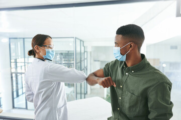 Fototapeta premium Doctor, greeting and man in hospital, elbow and healthcare policy for virus prevention. Medical service, patient and professional in clinic, compliance and scared with hello, face mask and protection