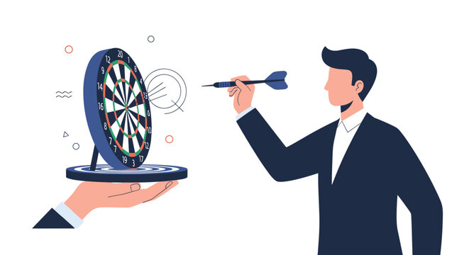 Businessman aiming a dart at a bullseye target held by a large hand, representing corporate goal setting and achieving objectives.