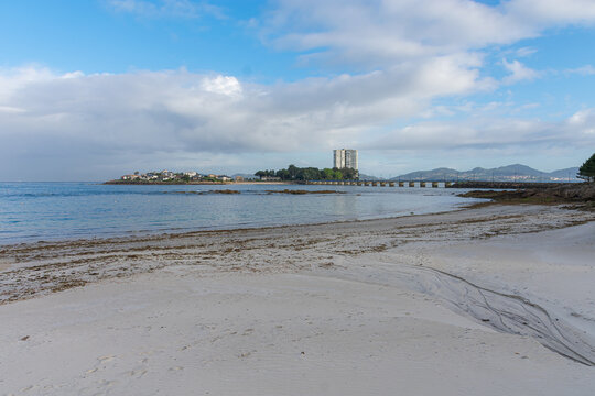 Toralla Island and its private bridge seen from the shore of Canido Beach in Vigo, Galicia