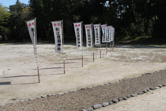 banners in a shinto temple (gokoku) in matsue in japan 